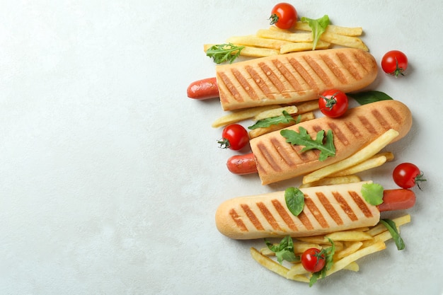 Concept of tasty food with french hot dog