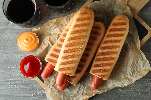 Concept of tasty food with french hot dog