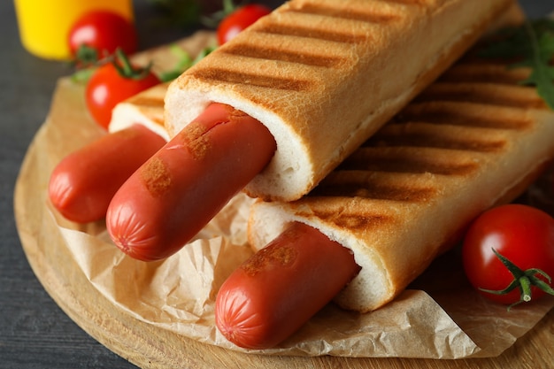 Concept of tasty food with french hot dog