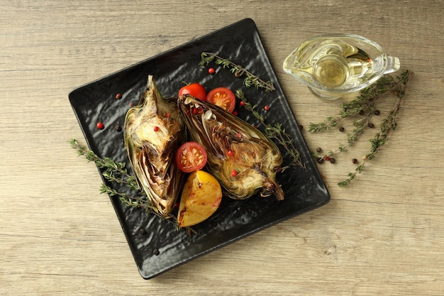 Concept of tasty food with grilled artichoke top view