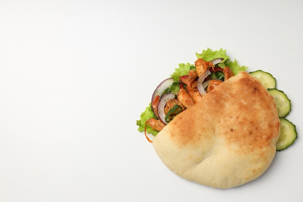 Concept of tasty food with pita with chicken, space for text