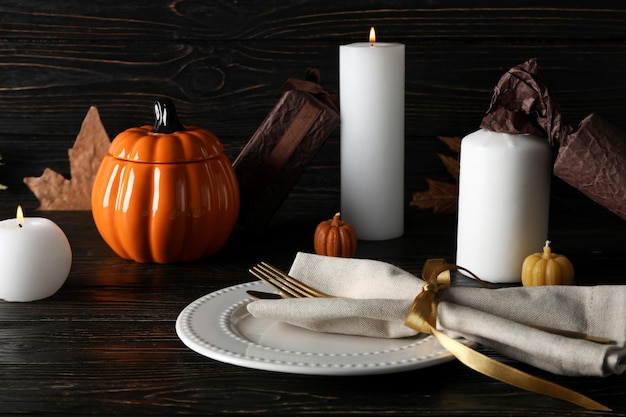 Concept of Thanksgiving day Autumn table setting on wooden background