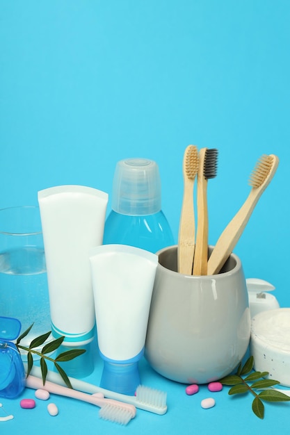 Concept of tooth or oral care on blue background