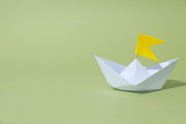 Concept of travel and adventure with paper boat