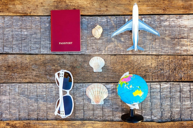 Concept of traveling on wooden background