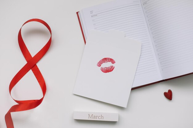 Concept Women39s Day Valentines Day March 8 Lipsticks cosmetic makeup products and accessories flatlay top view