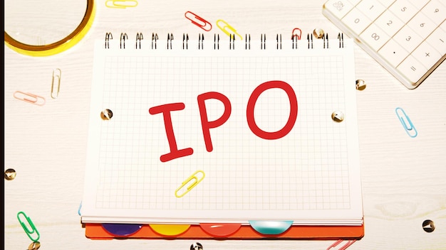 The concept of the word IPO written on a notebook initial public offering