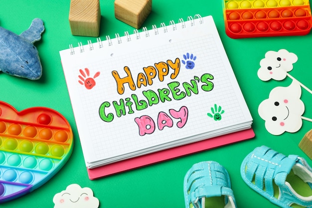 Concept of World Children's Day on mint background