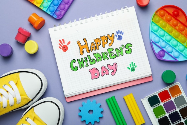 Concept of World Children's Day on violet background