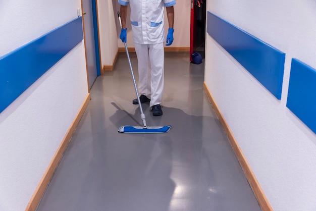 Conceptual photo of a hospital worker cleaning the ward