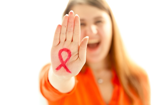 Conceptual photo of screaming woman with drawn red loop on hand