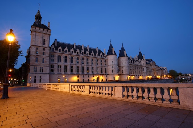 Conciergerie Building in Paris France in the evening