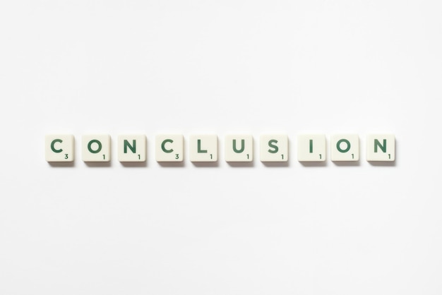 Conclusion formed of scrabble blocks on white background