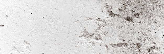 Concrete background texture of old dirty white gray rough concrete stone wall as backdrop grunge grey cement surface like structure paper material close up banner