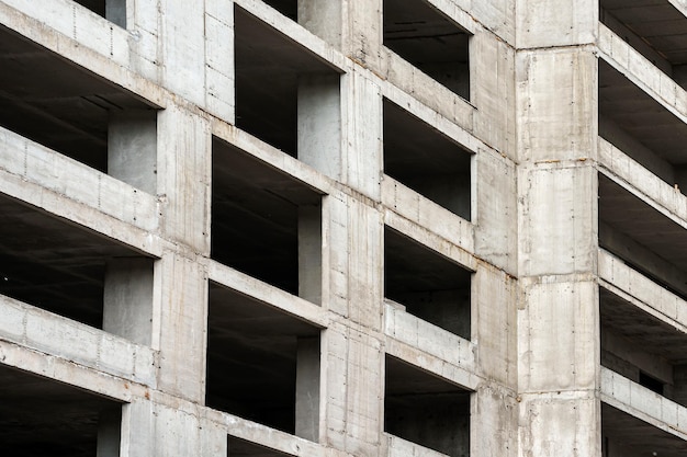 A concrete building with a large window that says'no windows '