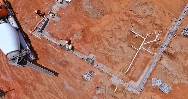 A concrete mixer truck was used to pour concrete columns for a new house