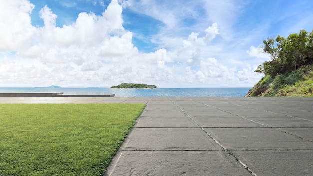 Concrete road floor and big garden with sea view 3d illustration of empty green grass lawn