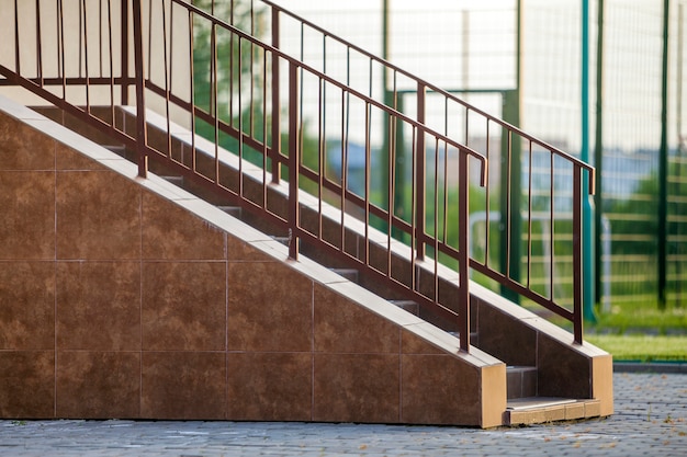 Concrete stairs covered with ceramic tiles