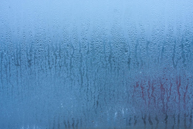 Condensation on the glass of a metalplastic window in a room high humidity in the room