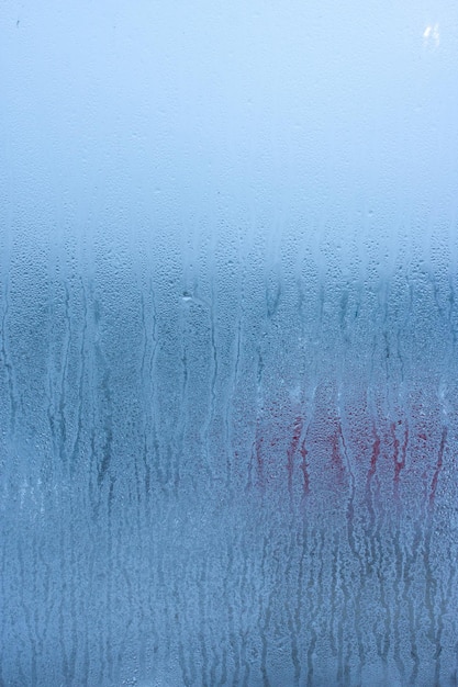 Condensation on the glass of a metalplastic window in a room high humidity in the room