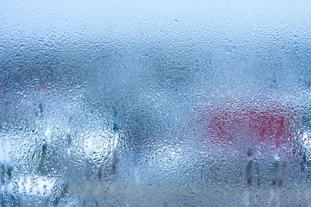 Condensation on the glass of a metalplastic window in a room high humidity in the room