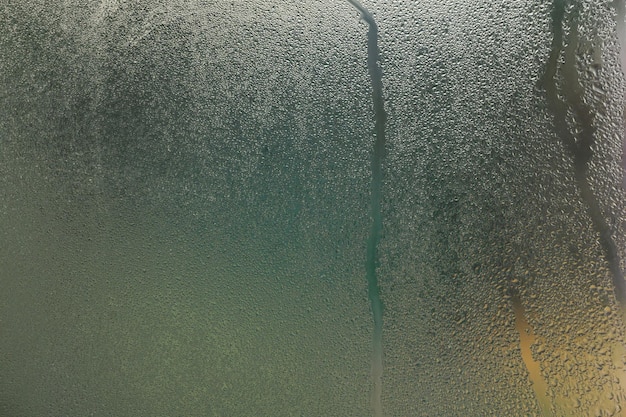 Condensation on the window from a sudden change in temperature outside and inside the house