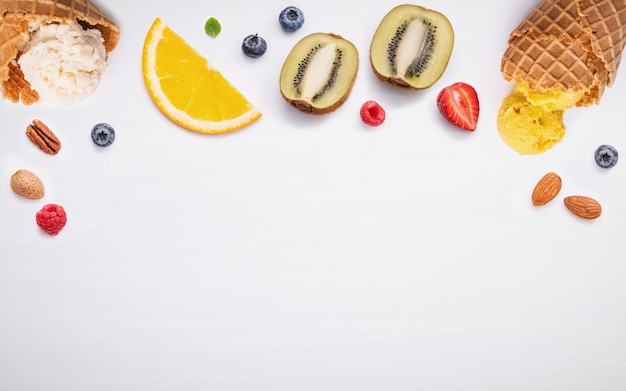 Cones and colorful various fruits for Summer and Sweet menu concept .