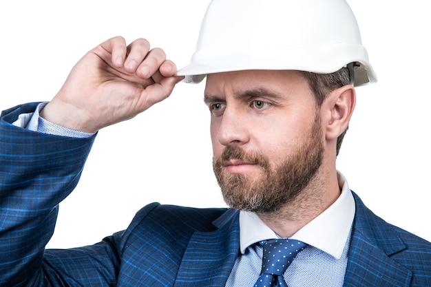 Confident businessman man in suit and safety helmet isolated on white, welcome.