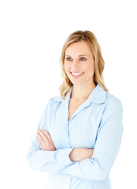 Confident businesswoman with folded arms smiling at the camera