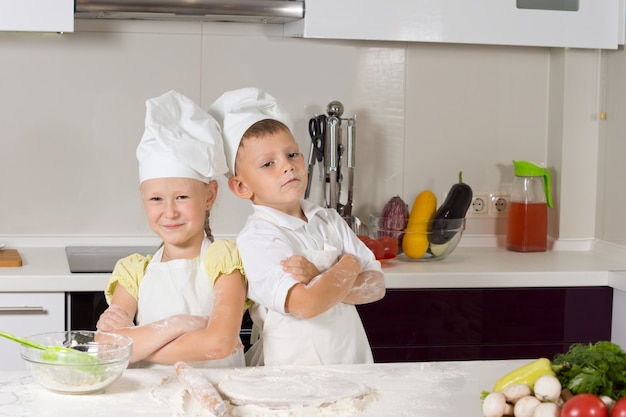 Confident Cute Kid Chefs Making Food to Eat in the Kitchen.