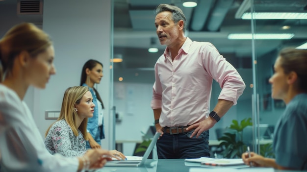 Photo a confident leader is giving a presentation to a team during a meeting in a modern office environment