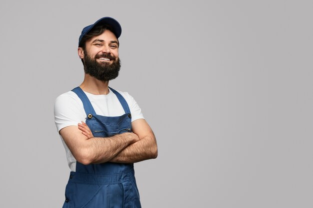 Confident locksmith looking at camera