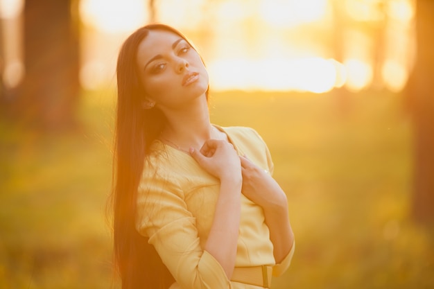 Confident model in bright sunset light