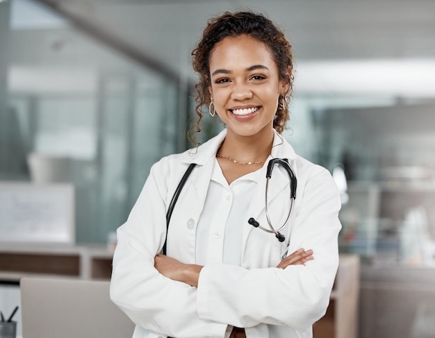 Confident in my medical ability. Cropped portrait of an attractive young female doctor standing with her arms folded in the office.