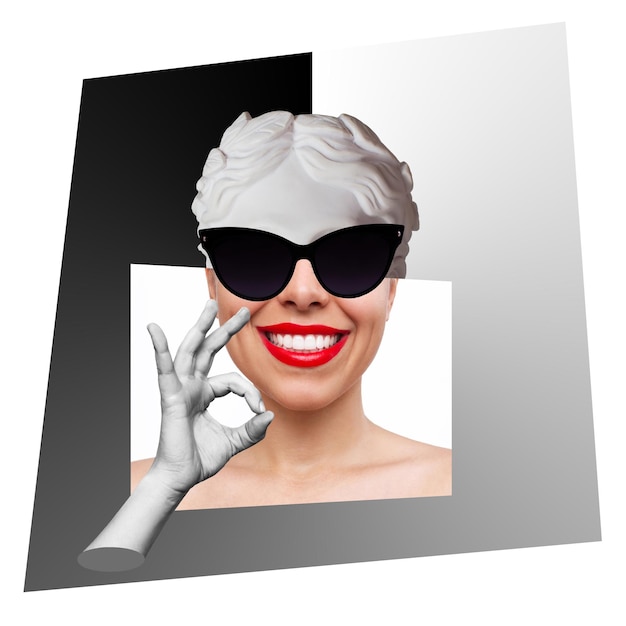 Confident smiling antique female statue's head in black sunglasses with red lips shows ok gesture