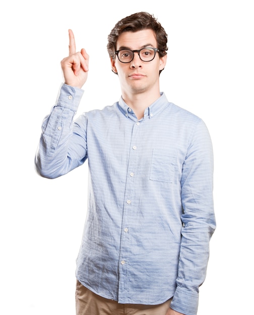 Confident young man pointing