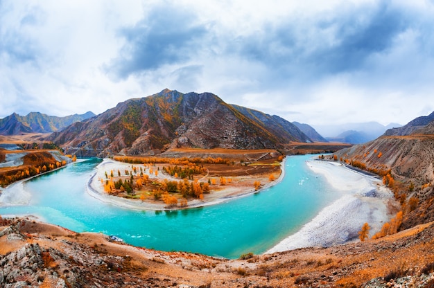 Confluence of Chuya and Katun rivers in Altai, Siberia, Russia. Famous tourist destination in Altai mountains. Autumn landscape