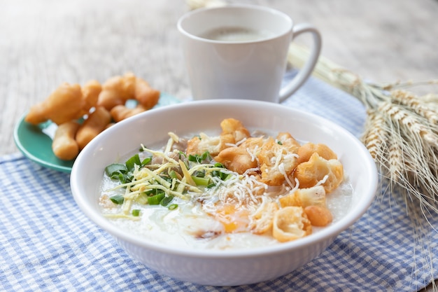  Congee  boiled egg with soy milk and Chinese deep fried double dough stick