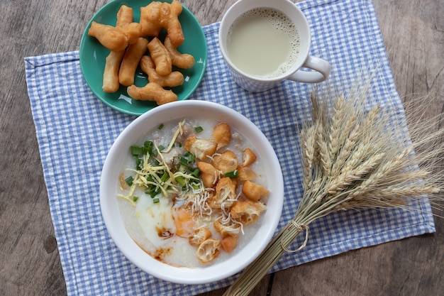  Congee  boiled egg with soy milk and Chinese deep fried double dough stick