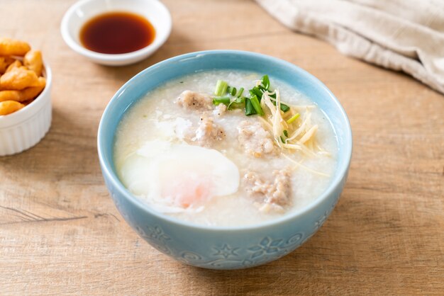 congee with minced pork in bowl 