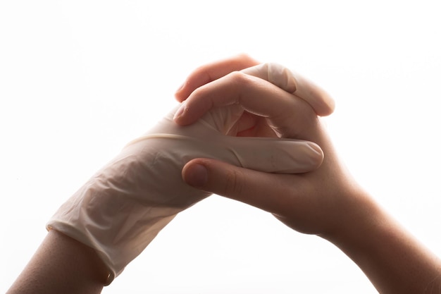 Connected Hand with sterile latex protective glove gives a helping hand