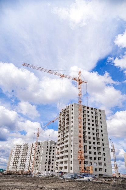 Construction cranes and construction of new houses