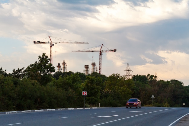 Construction cranes on the horizon