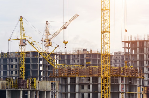 Construction of houses cranes, crash crane crash on the building