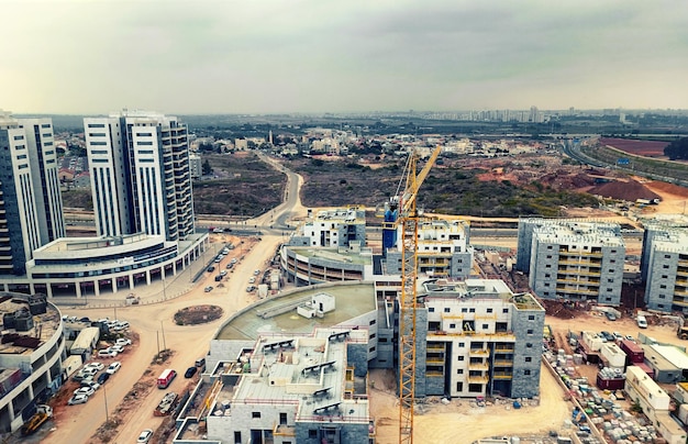 Construction of houses in Israel 2022 View from a highrise building selective focus