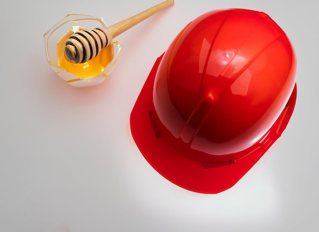 Construction red helmet with honey bowl