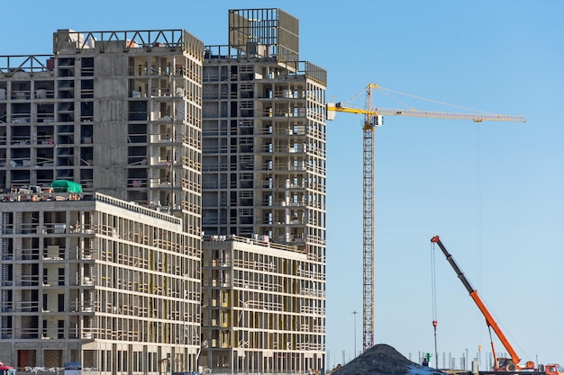 Construction of a residential building and cranes real estate