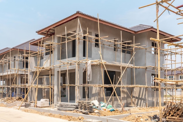 Construction residential new house in progress at building site housing estate development