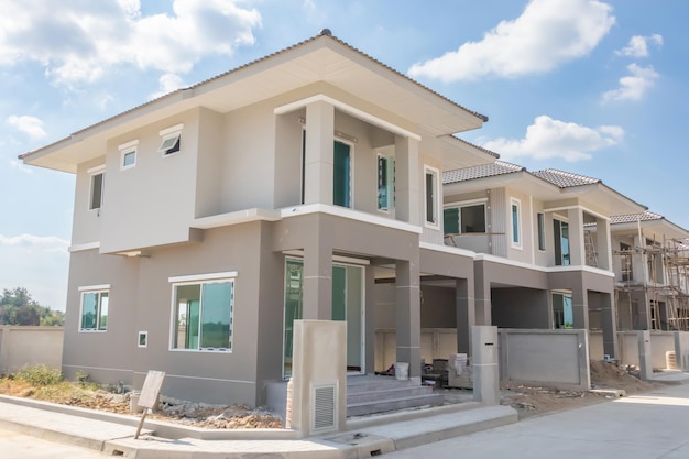 Construction residential new house in progress at building site housing estate development