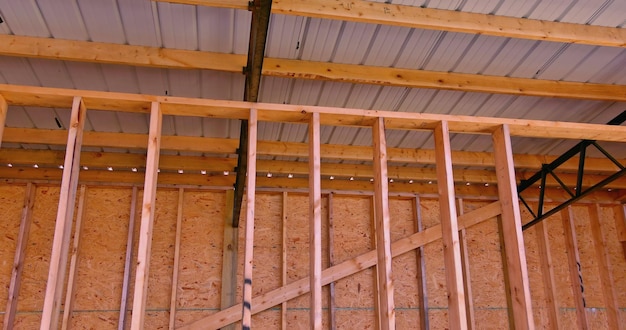 Construction site in metal roof of a warehouse center in storage building frame